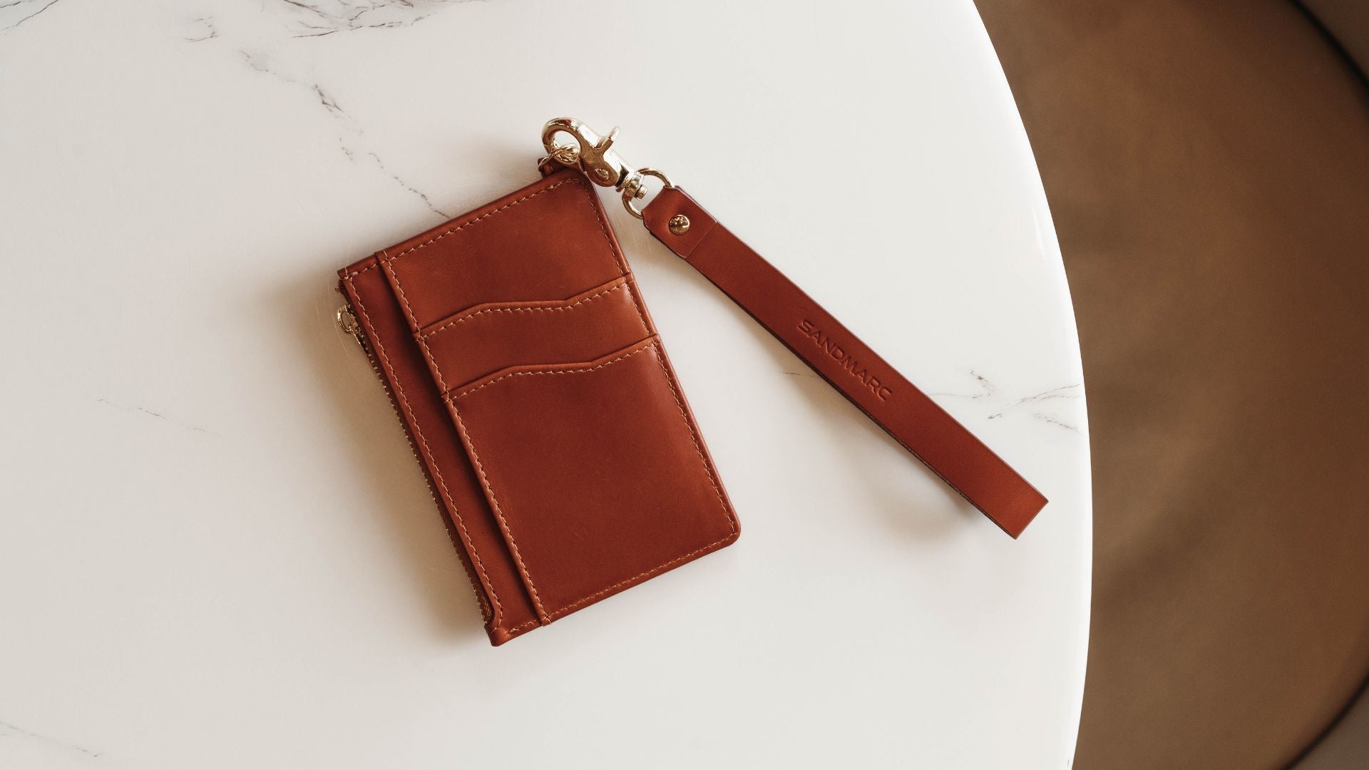 Her Capture Leather Wallet | Press Release