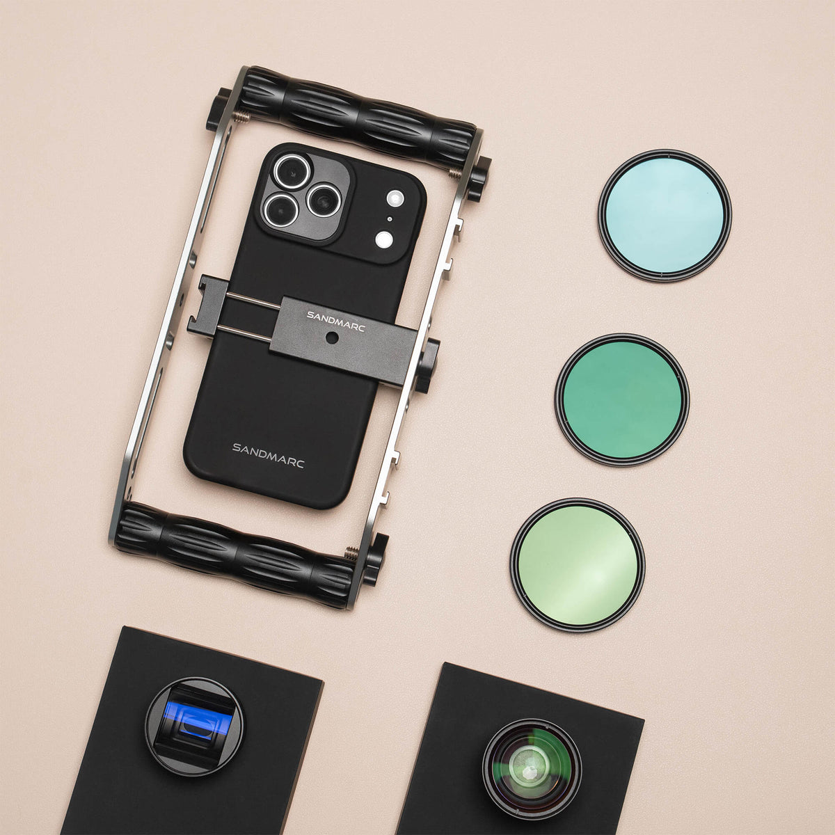 iPhone 18 Pro attached to a SANDMARC Film Rig next to the Anamorphic and Telephoto Lenses  and the Hybrid Filters