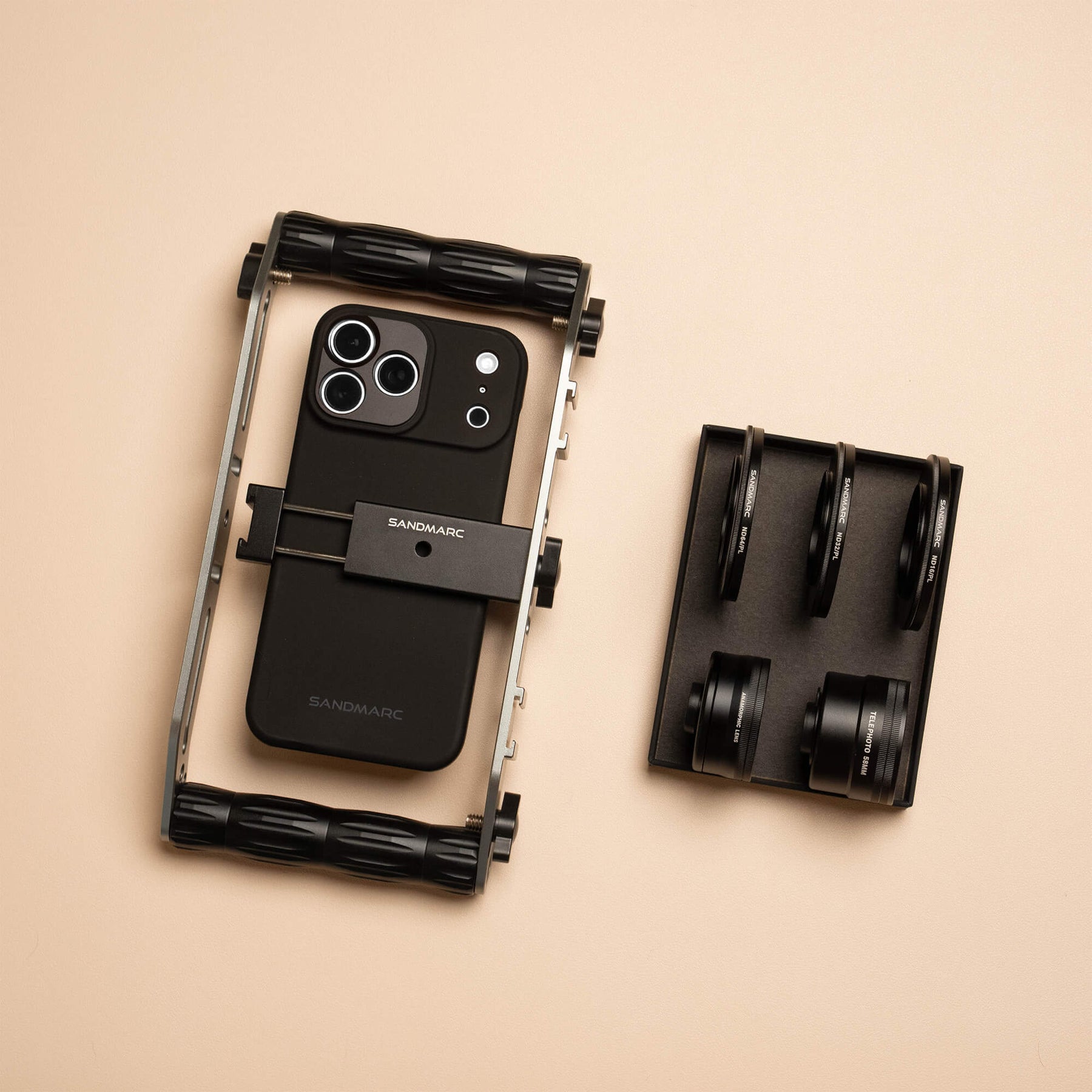 iPhone 18 Pro attached to a SANDMARC Film Rig next to the Anamorphic and Telephoto Lenses  and the Hybrid Filters