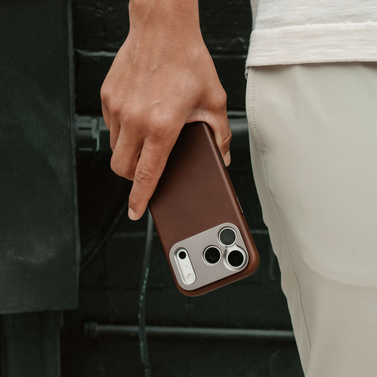 iPhone brown leather case in concrete background