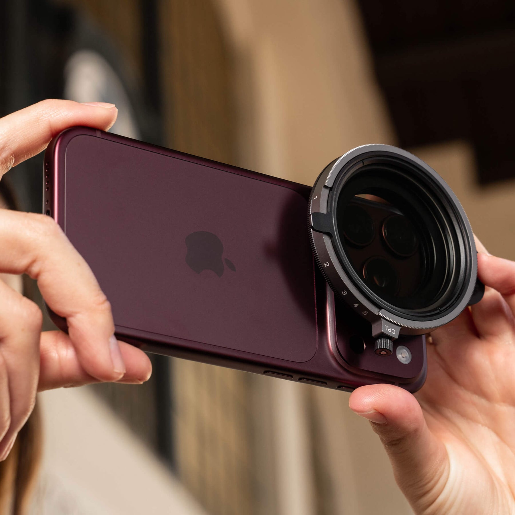 SANDMARC Fusion Filter attached to the iPhone 18 Pro 