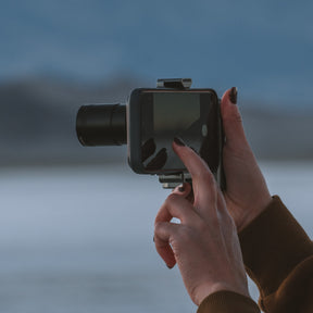 Creator Grip attached to iPhone and SANDMARC Prolight and Carbon Tripod