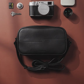 The SANDMARC leather crossbody leather sling (bag) with an adjustable shoulder strap, shown on a plain white background.